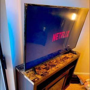 55 inch Smart Samsung tv and Tv fireplace stand with heater. Cash or cash only
